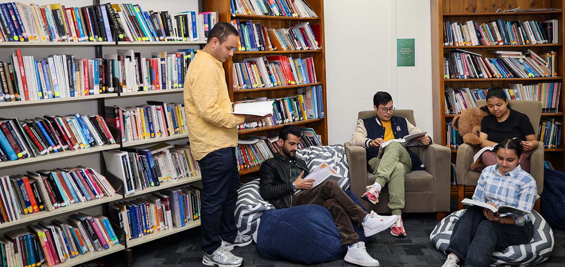 AIHE students studying in library